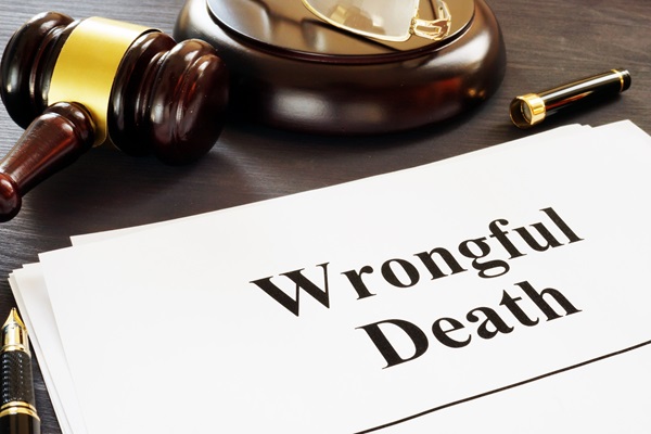 Wrongful death lawsuit and gavel on a table.